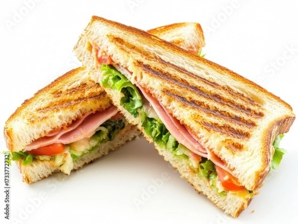 Fototapeta Sandwich with ham, lettuce and tomatoes against a clean white background. Suitable for advertising cafes, fast food restaurants, culinary blogs and food delivery sites. Minimalistic background. Banner