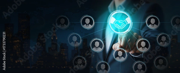 Obraz Digital Networking and Business Partnership Interface, Handshake icon connects people in glowing tech-driven network