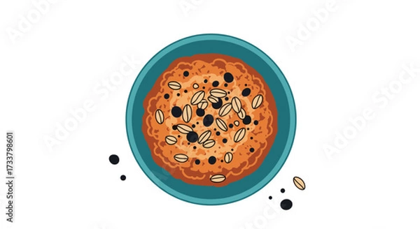 Fototapeta A delectable overhead view of a warmly baked cookie dotted with chocolate chips and crunchy nuts.
