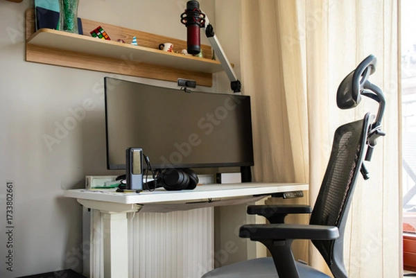 Fototapeta A tranquil and minimalist home office with a focus on clean lines and natural light