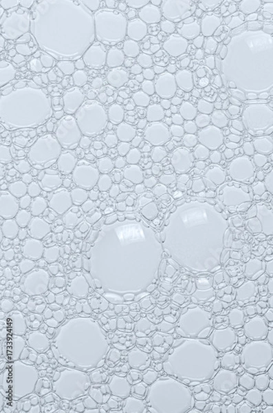 Fototapeta The texture of the foam of shower gel or soap suds. Macrophotography