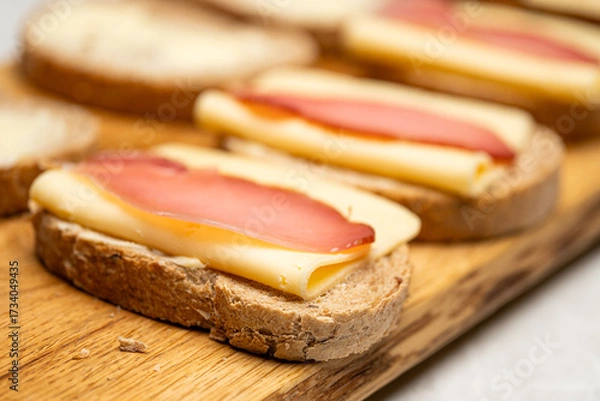 Obraz Classic Ham Sandwich with Yellow Cheese – Fast Food Closeup