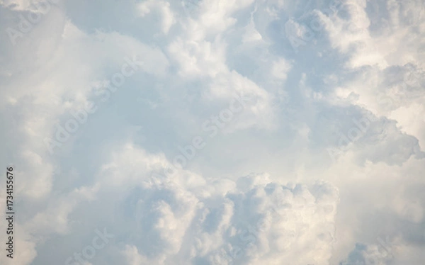 Fototapeta White fluffy cumulus clouds podium on blue sky with empty space background.Beauty cosmetic product placement pedestal present promotion minimal stand display,dreamy concept.
