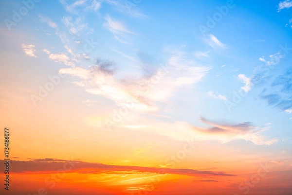 Obraz Beautiful , luxury soft gradient orange gold clouds and sunlight on the blue sky perfect for the background, take in evening,Twilight, Large size, high definition landscape photo