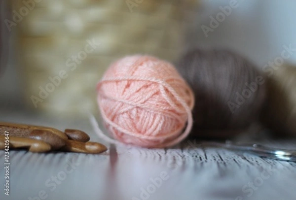 Obraz Clews balls of yarn wool and crochet hooks and a basket photo 