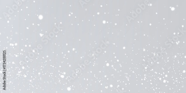 Fototapeta Winter background abstract with snow is dancing randomly on grey background, Softly falling delicate white sparkles and bokeh lights background with winter seasonal concept abstract background.
