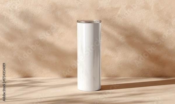 Fototapeta Minimalist White Tumbler Against Soft Beige Background with Shadows
