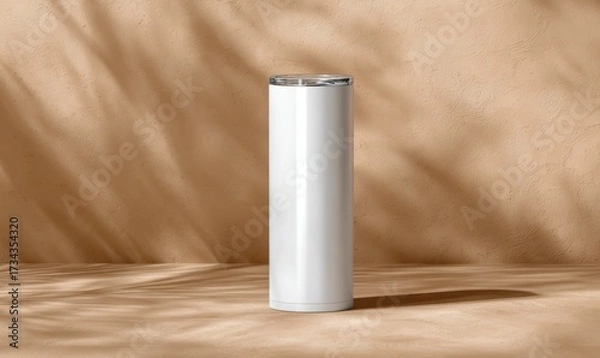 Fototapeta Minimalist White Travel Mug on Beige Background with Soft Shadows
