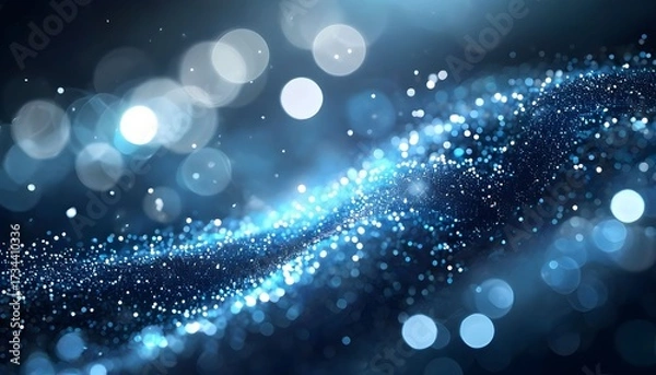 Fototapeta An abstract, swirling wave of glowing blue light particles and soft bokeh on a dark background.