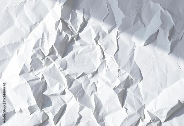 Fototapeta Deep creases and shadows on crumpled white paper, showing texture and light reflection,  shadow, crumpled paper