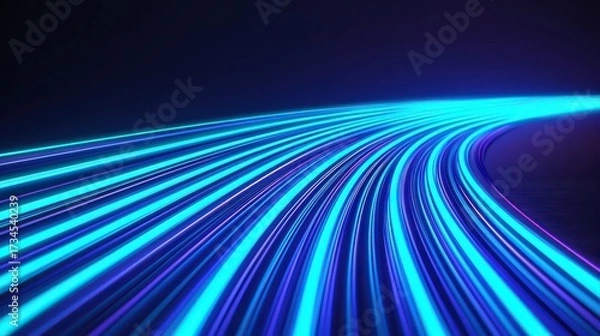 Fototapeta A vibrant display of blue light trails on a dark background, creating a sense of motion and depth.