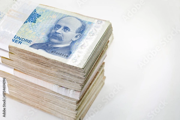 Fototapeta Many packs of Norway krone bills, 200 krone, stacks of banknotes, pile of cash, paper money. The concept of financial success, Investment and wealth. isolate on white background.