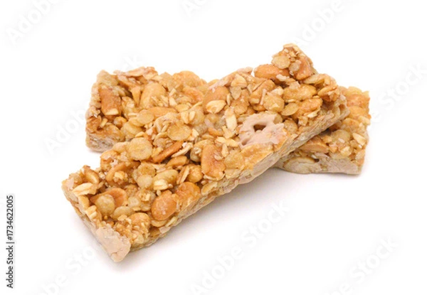 Obraz Honey bars with peanuts, sesame and sunflower seeds isolated