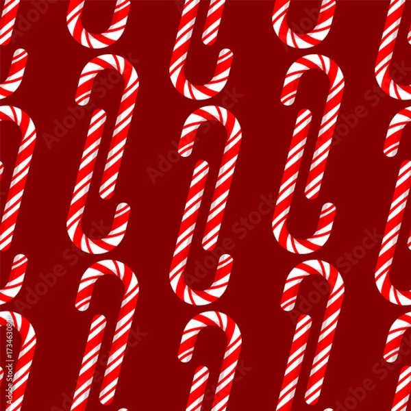 Fototapeta Seamless pattern of red and white striped sugar candy on a red background