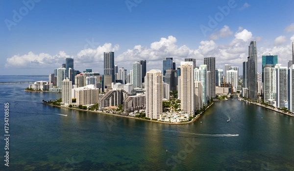 Fototapeta Aerial view of Brickell skyscrapers. Modern cityscape of downtown Miami. Panoramic Miami skyline above the coastline. Brickell Key aerial view in Miami.