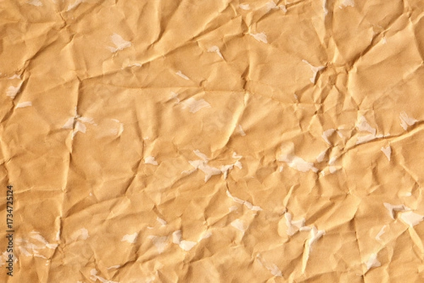 Fototapeta Brown paper sheet with crumpled and stains texture