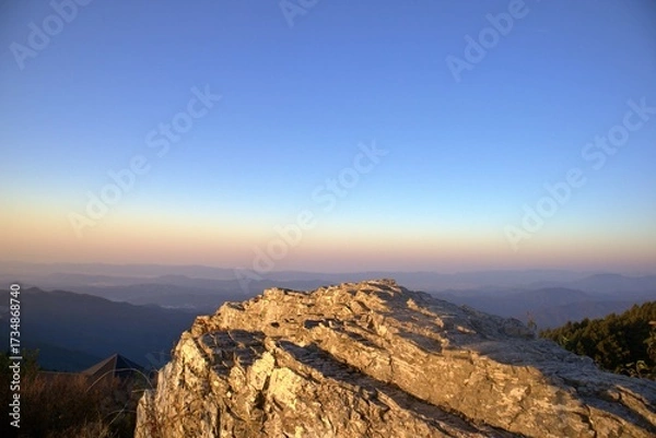 Obraz 岩のテクスチャと秋の夕焼け空