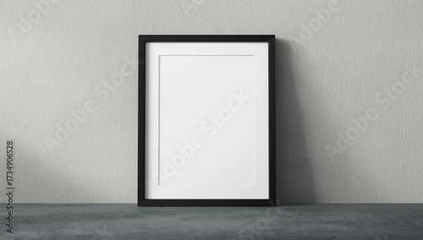 Fototapeta one small empty white frame for a picture and a photo on the shelf at the side, mock-up 