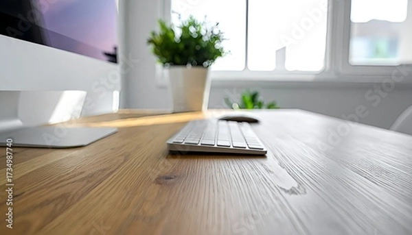Obraz Serene and Sunlit Minimalist Workspace on a Natural Wood Desk