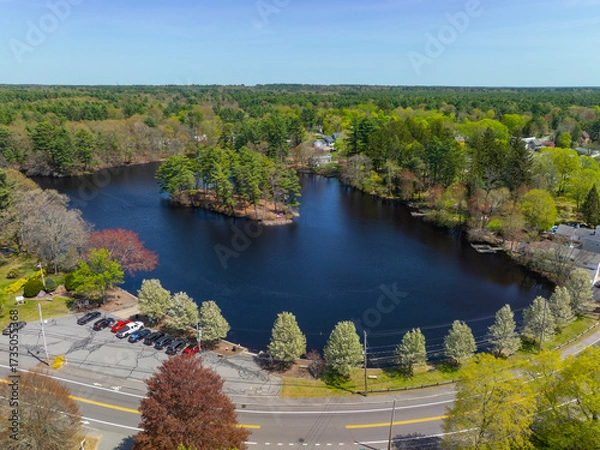 Fototapeta Johnson Pond aerial view on Forge River in spring at the historic center of Raynham, Bristol County, Massachusetts MA, USA. 