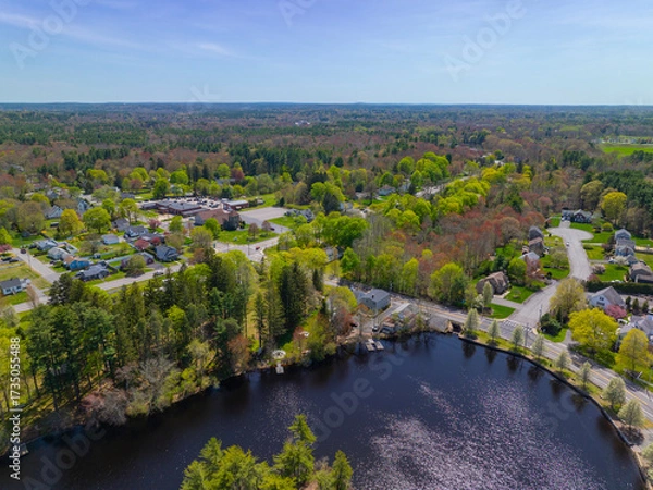 Fototapeta Johnson Pond aerial view on Forge River in spring at the historic center of Raynham, Bristol County, Massachusetts MA, USA. 