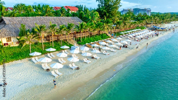 Fototapeta Aerial view of tropical Doc Let beach with turquoise waters and white sand in Vietnam
