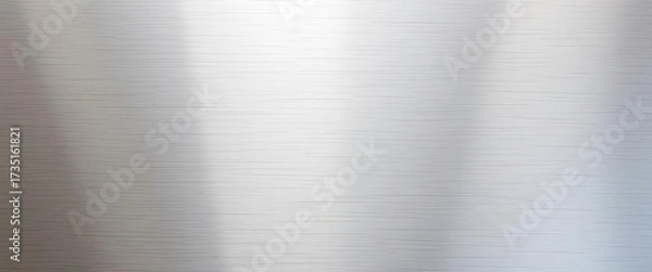 Fototapeta Brushed stainless steel surface, showing fine parallel lines and subtle reflections,  abstract,  detail