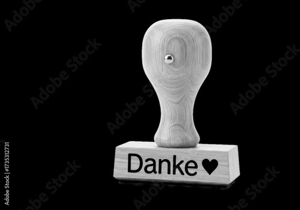 Obraz Wooden rubber stamp with the german word danke and a heart isolated on transparent background