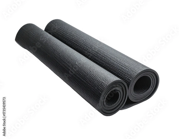 Fototapeta Two black rolled yoga mats on a black background, ready for exercise