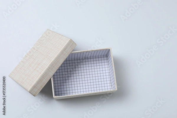 Fototapeta empty paper box with lid on white background, top view