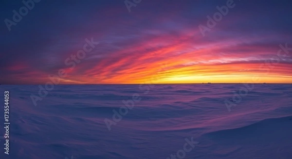 Obraz Vibrant sunset sky over a vast snowy landscape with a panoramic view
