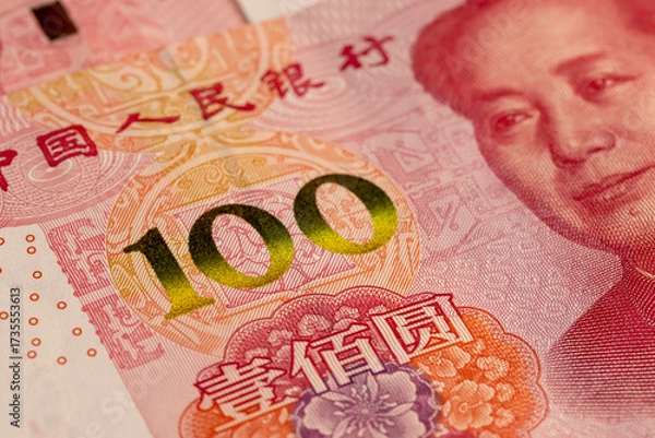 Fototapeta the obverse of a large number of genuine Chinese yuan money stacked on top of each other