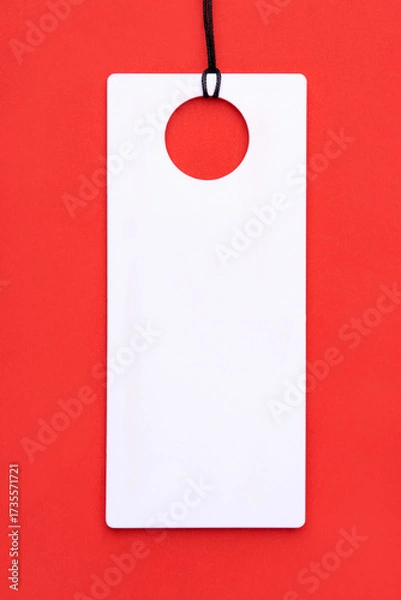 Fototapeta Empty white tag on red background.