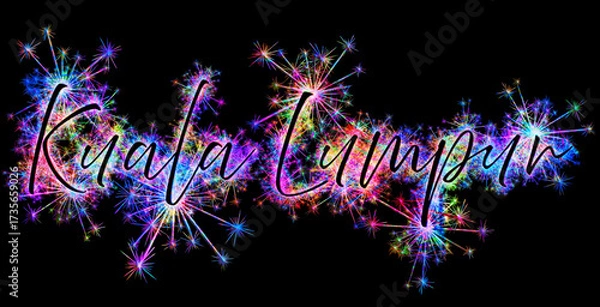 Fototapeta Kolorowe zimne ognie i fajerwerki układające się w kształt nazwy miasta Kuala Lumpur stolicy Państwa Malezja.