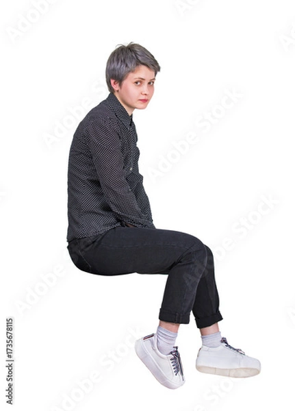 Fototapeta Side view full length fatigue seated woman looks disappointed to camera. Tired female sitting alone feeling displeased isolated on transparent background