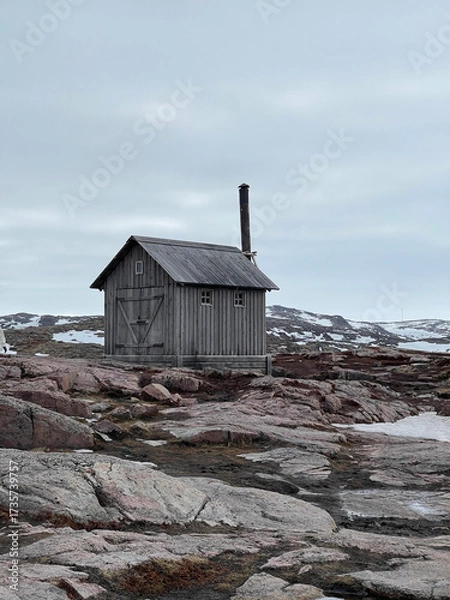 Obraz A lonely hut in the tundra on the shore of the Barents Sea, Russia