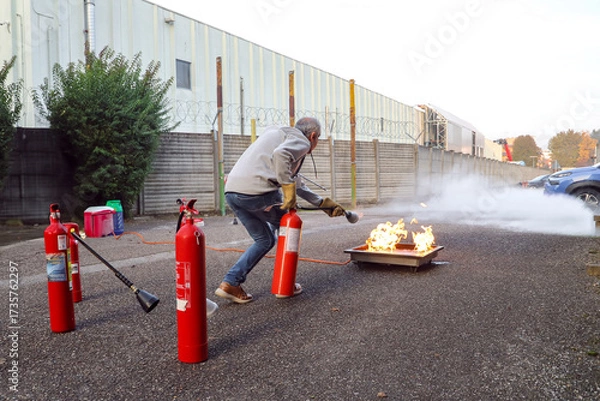Obraz corporate safety - exercise during a firefighting course
