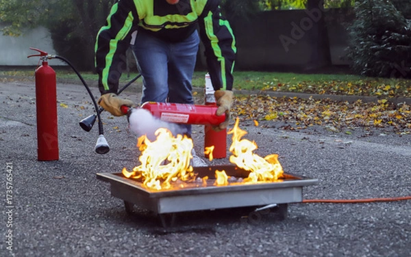 Obraz corporate safety - exercise during a firefighting course