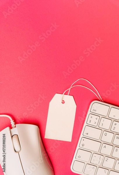 Fototapeta Blank price tag and keyboard on pink background online sale concept. High quality photo