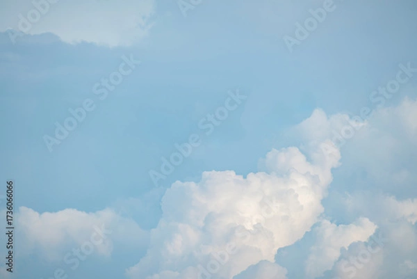 Fototapeta White fluffy cumulus clouds podium on blue sky with empty space background.Beauty cosmetic product placement pedestal present promotion minimal stand display,dreamy concept.