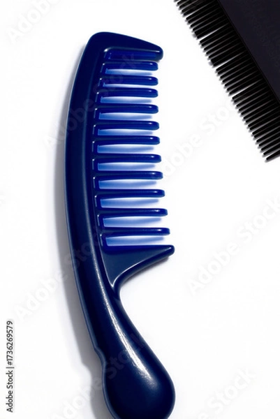 Fototapeta A Comb Plastic On A White Background