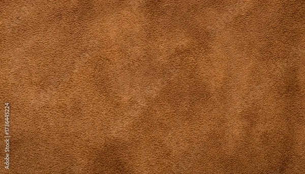 Obraz warm brown suede leather texture with soft matte surface and fine natural grain pattern creating an earthy organic background ideal for wallpaper banner design or commercial branding