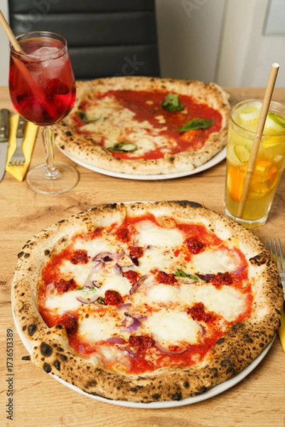 Obraz Spicy pizza and Aperol Spritz on wooden table