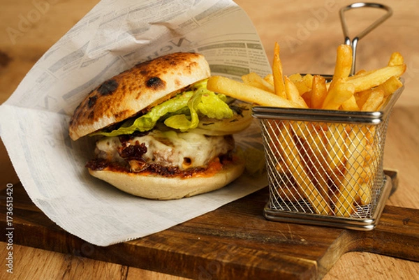 Obraz Beef burger with grilled onions and fries