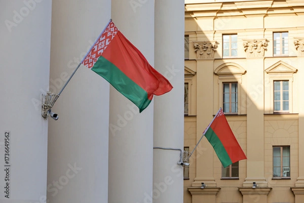 Fototapeta National flags of Belarus on the building of State Security Committee in Minsk 