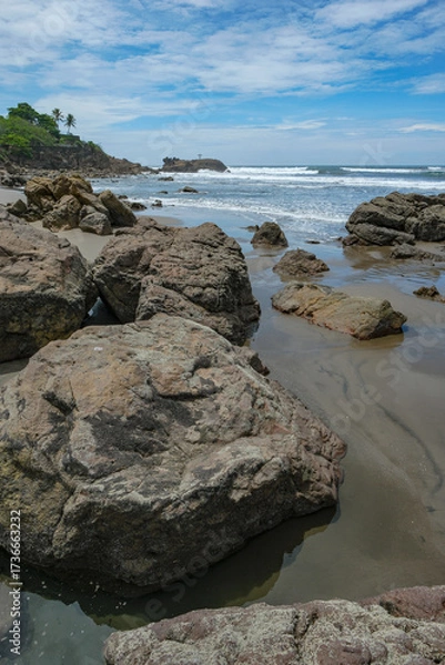 Fototapeta Leon, Nicaragua - September 8, 2025: Las PeÃ±itas Beach, a small fishing village in the department of Leon, Nicaragua.
