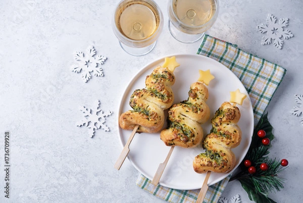 Fototapeta Basil mozzarella garlic Puff pastry pies in the form of Christmas tree for Christmas holidays