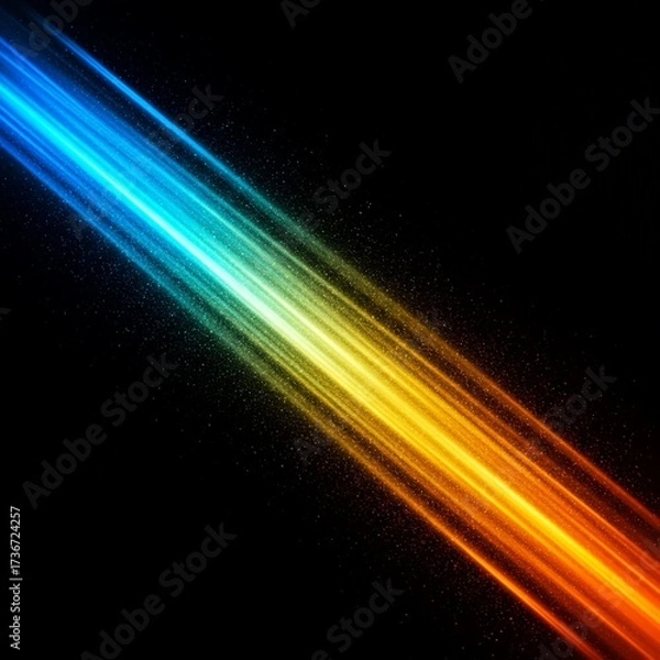 Obraz A vibrant diagonal beam of light with a blue to orange color gradient and sparkling particles on a black background.