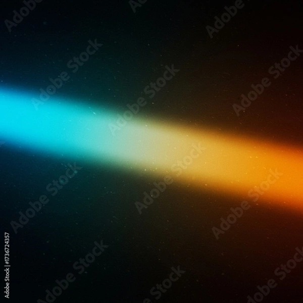 Fototapeta Vibrant blue and orange light beams crossing on a dark background with subtle particle effects, creating a dynamic visual gradient.