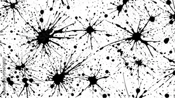 Fototapeta Black and white ink splatters captured on a white background surface creating abstract expressive stains with artistic textured composition and graphic detail